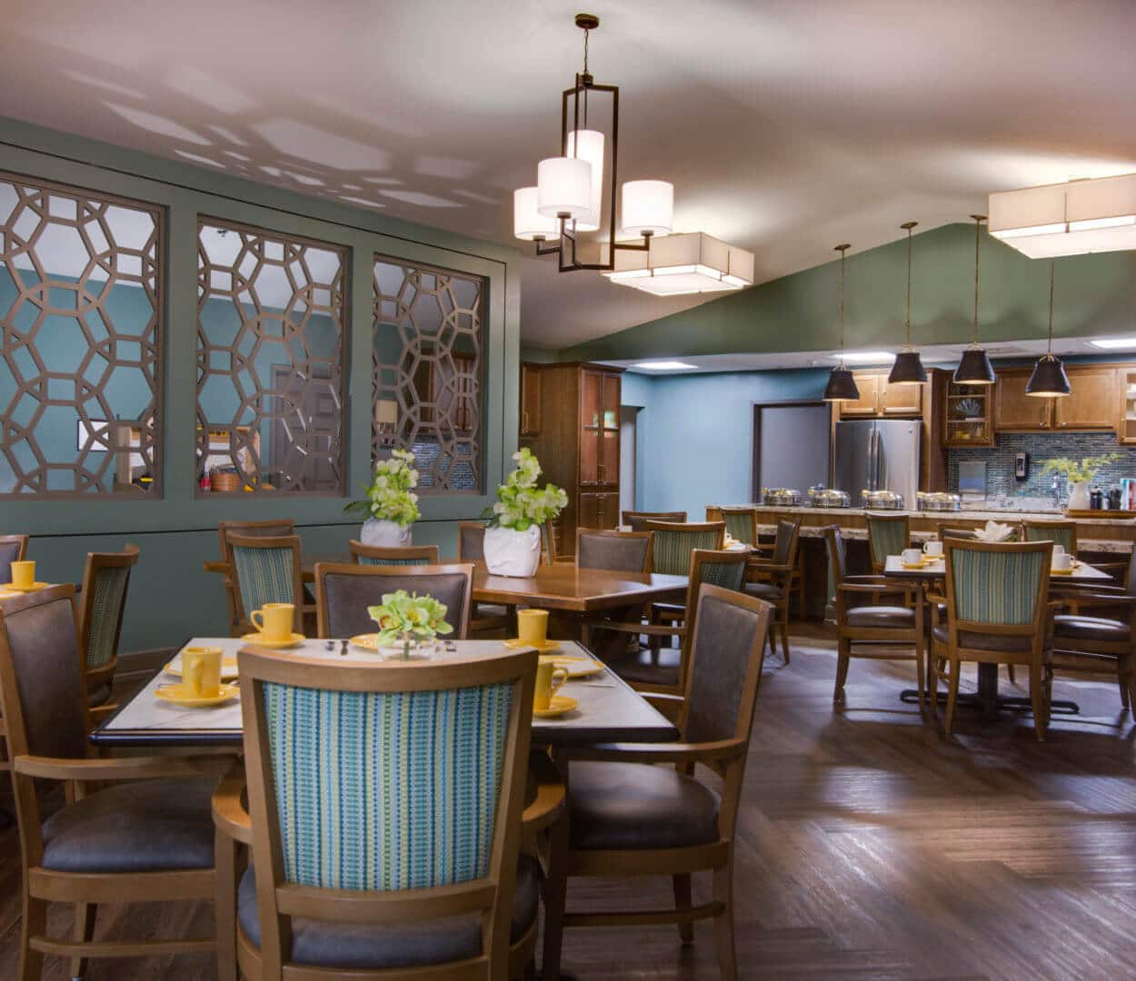 Cafe/bistro with tables, chairs, yellow cup and saucers