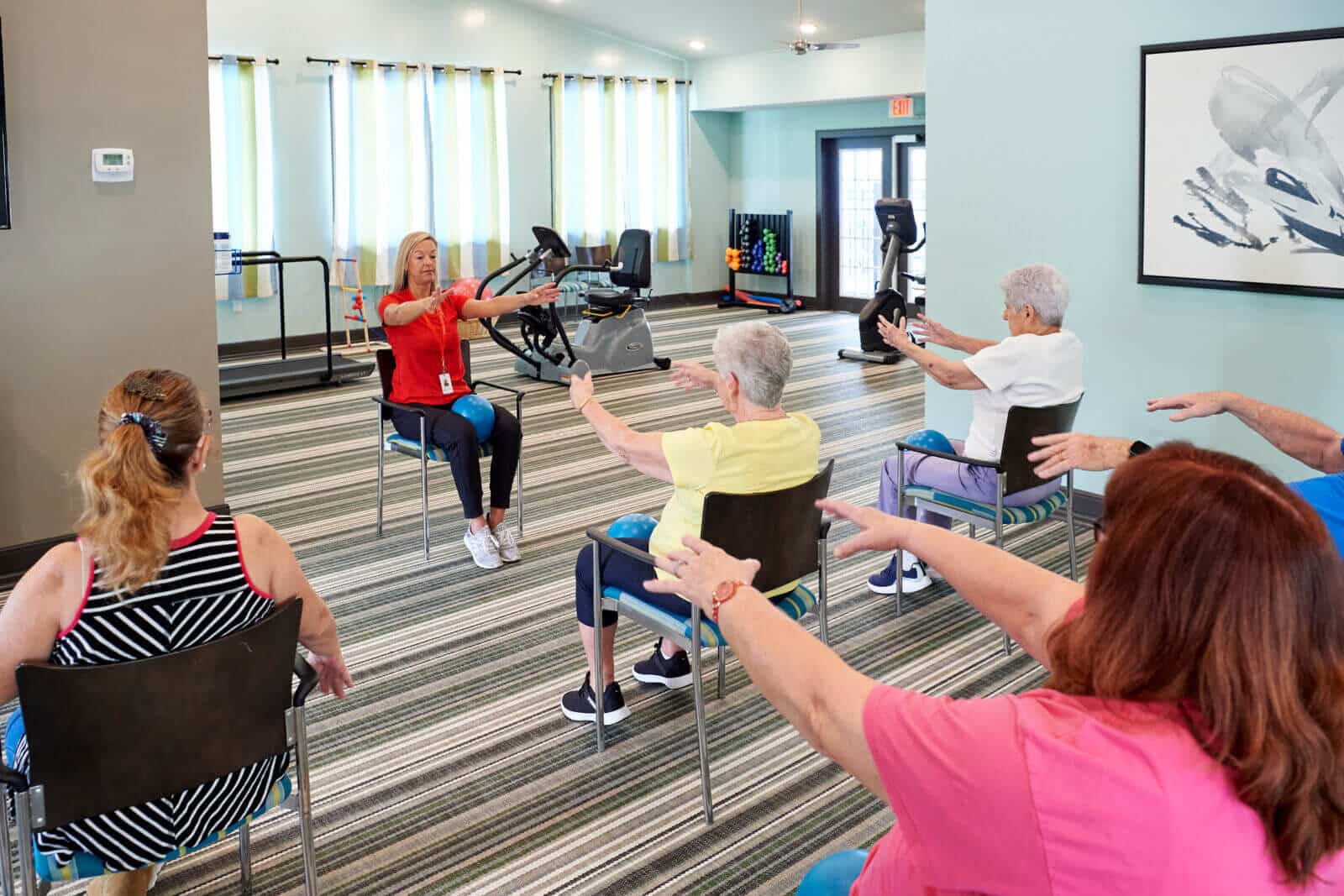 fitness center with chair yoga class